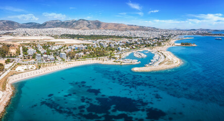 Fototapeta na wymiar Aerial drone view Glyfada beach, part of the south Athens riviera with yacht marinas and turquoise sea, Greece