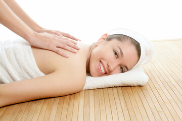 Fototapeta na wymiar Beautiful woman on spa massage on her back