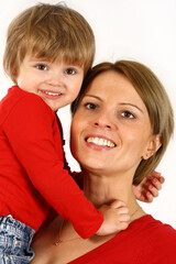 close up of young mother and daughter over white background