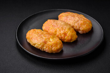 Delicious steam cutlets with carrots, cheese, salt and spices