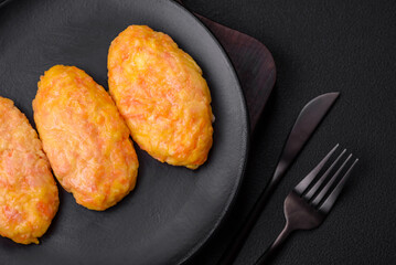 Delicious steam cutlets with carrots, cheese, salt and spices
