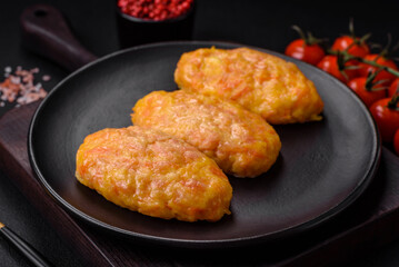 Delicious steam cutlets with carrots, cheese, salt and spices