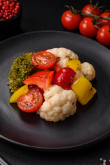 Delicious fresh salad of broccoli, cauliflower, sweet peppers and cherry tomatoes
