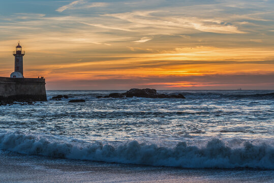 Sunset over Atlantic Ocean. View from Carneiro beach in Porto coty in Portugal