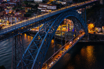 Evening view of Dom Luis I Bridge in Porto, Portugal
