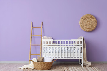 Interior of children's room with crib, ladder and basket