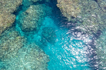 沖縄本島国頭郡国頭村謝敷のビーチをドローンで空撮する風景 Aerial drone view of the beach at Shashiki, Kunigami-son, Kunigami-gun, Okinawa Island 