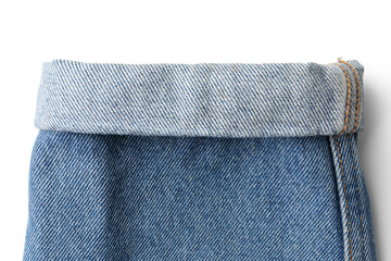 Stylish blue denim jeans on white background