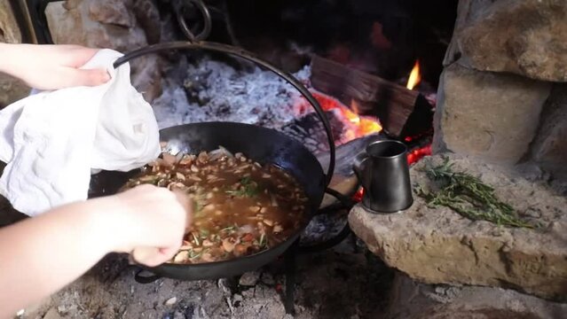 cooking meat in a pan