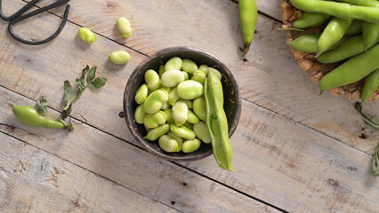 Fresh and raw green broad beans