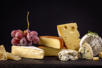 still life with cheese and grape