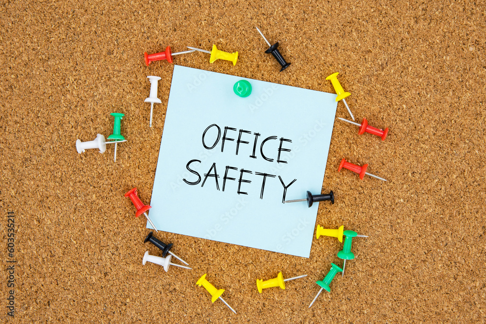 Fototapete office safety text on light blue post-it paper pinned on bulletin cork board surrounding by multi co
