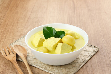 Sayur Terik Tahu Telur Puyuh, made from tofu, quail egg and coconut milk. Indonesian traditional food
