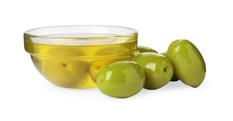 Cooking oil in glass bowl and olives on white background