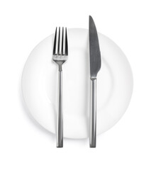 Clean plate with shiny cutlery on white background, top view