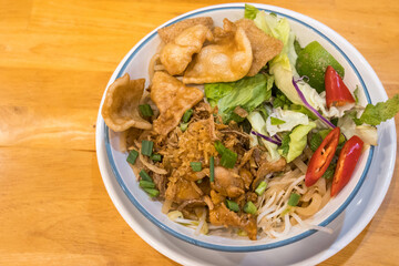 Cao lau is a regional Hoi An, Vietnamese dish made with noodles, pork