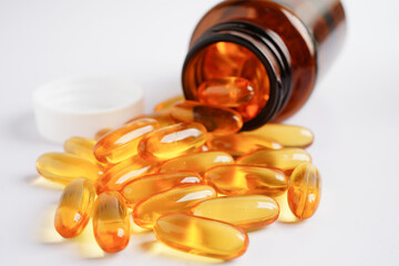 Fish oil or Cod liver oil gel in capsules with omega 3 vitamins, supplementary healthy food