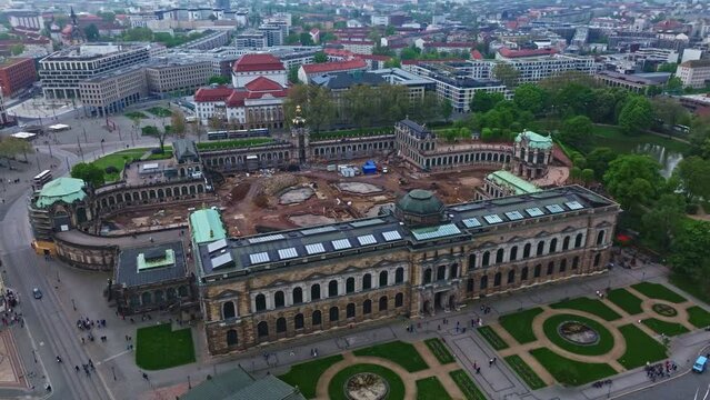 Drone shot of The Zwinger ( Dresdner Zwinger ) , it is a palatial complex with gardens in Dresden, Germany . It is one of the most important buildings of the Baroque period in Germany .
