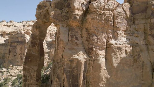 Aerial-Ascending over the iconic Eagle Canyon Arch in the San Rafael Swell a large asymmetric anticline in which sedimentary rocks ranging in age from Pennsylvanian to Cretaceous are exposed