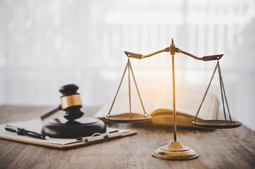 Law theme, mallet of the judge, law enforcement officers, evidence-based cases and documents taken...
