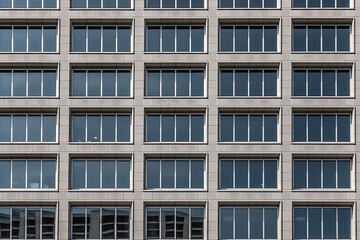 Fototapeta na wymiar modern skyscraper with a glass facade and many floors Generative AI