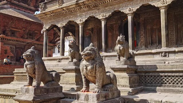 Lion statues at the entrance of Krishna Mandir (Krishna Template) at Patan Durbar Square, Lalitpur, Kathmandu Valley, Nepal