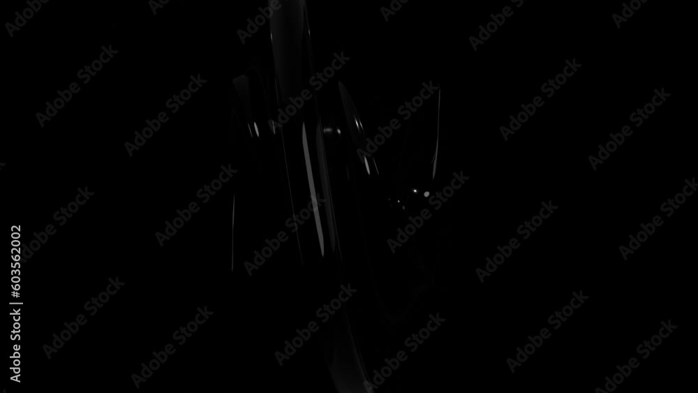 Poster an abstract figure made of black smooth plastic deforms and rotates and moves on a black background.