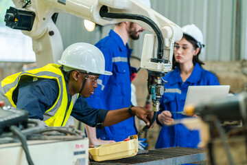 professional technician engineer working to control electrical power and safety service system, electrician working to maintenance and checking industrial equipment in term of factory technology