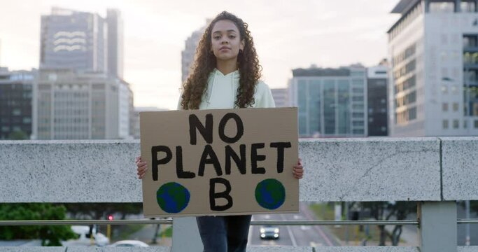 Protest, portrait and woman holding poster for climate change, global warming crisis and eco justice. Girl, protesting and banner to save, protect and fight for planet earth or environment politics