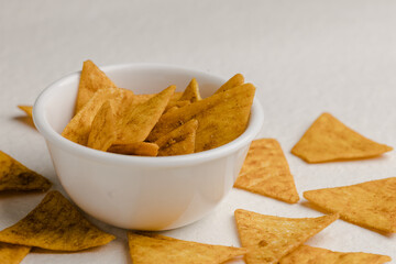 Mexican nachos chips, isolated on white background