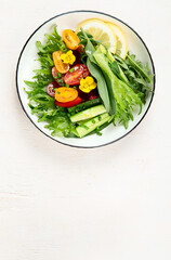 Spring vegetable salad. Tasty healthy food. top view