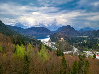 Fototapeta na wymiar Castle and Beautiful Countryside with the Bavarian Alps in the Distance - Bavaria, Germany