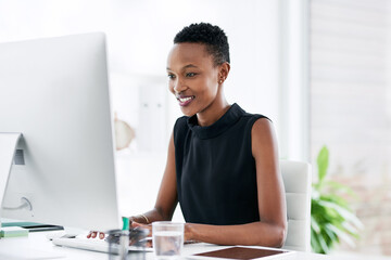 Business, computer and happy black woman in office, smile and typing email on light background....