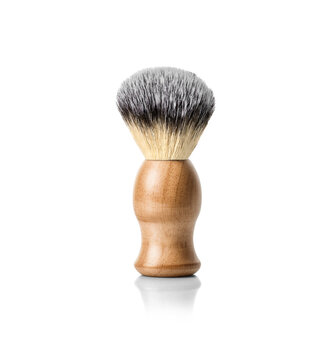 Classic Shaving brush with wooden handle with raccoon fur isolated on white background