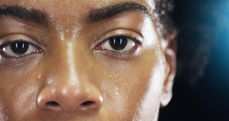 Eyes, fitness and portrait of woman with sweat on dark background for workout, exercise and training. Health, wellness and face zoom of female person with dedication, motivation and focus for sports - obrazy, fototapety, plakaty