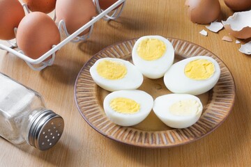 Slice boiled eggs on the table