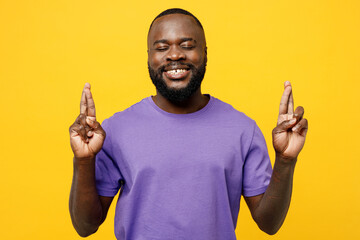 Young man of African American ethnicity he wear casual clothes purple t-shirt waiting for special...