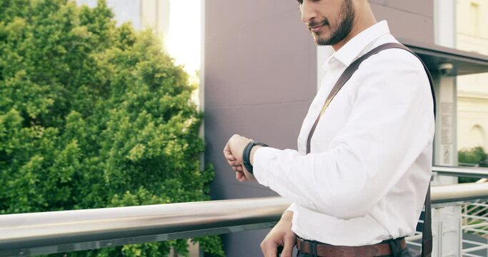 City, watch and professional man check time for business schedule, appointment commitment or corporate agenda. Smartwatch, waiting and outdoor person, agent or late lawyer looking at wrist clock