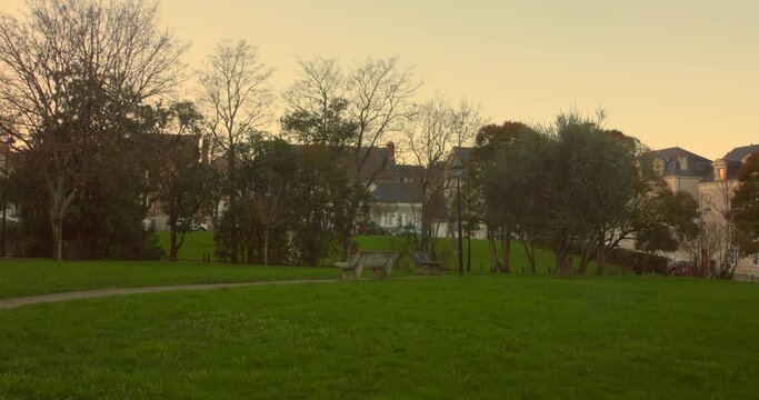 Verdant Meadows Of Place de la Paix Garden In Angers, France. Wide Shot