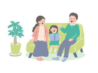 ソファに座って会話をする家族