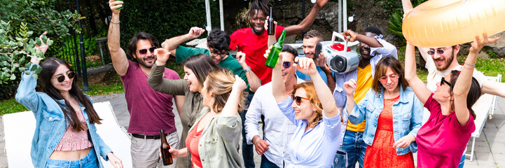 Multiracial gen z dancing in outdoor – multicultural young people having fun with boombox – diverse friends cheering with beer bottle - horizontal web banner size for header