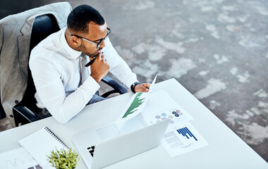 Financial report, laptop and black business man in his office or finance analyst or data graph and...