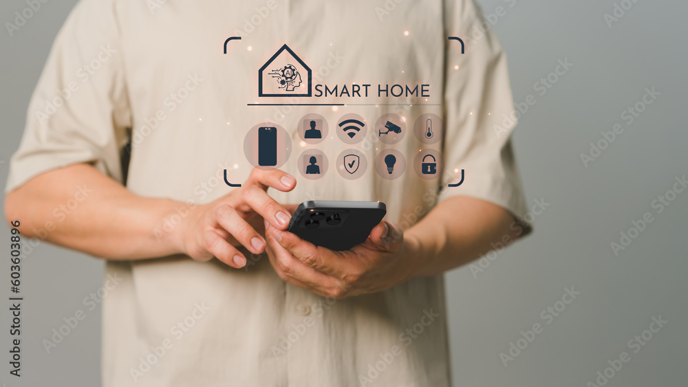 Poster Iot or Internet of Things of smart home automation app concept. Adult man controlling technology AI smart home devices using a smartphone or phone with launch application in the bed room.