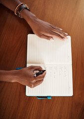 Checklist, notebook and hands of woman writing in book for planning, organization and to do list at...