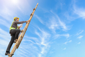 Asian business man engineer climbing up ladder with blue sky, career growth and success concept