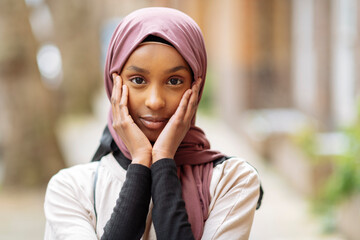 Portrait of young woman in hijab