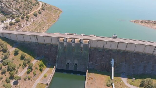 An impressive shot of the enormous concrete spill gates and the Alange dam wall