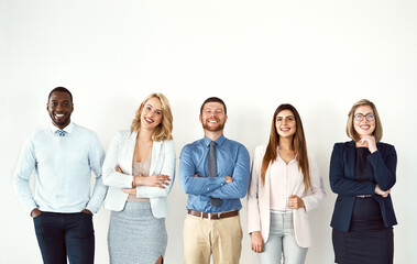 Law portrait, smile and teamwork of business people by white wall background mockup in workplace. Face, confident group and lawyers standing together with arms crossed, diversity and collaboration.