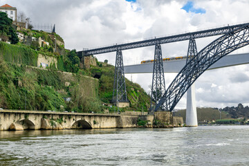 Fototapeta na wymiar Douro river in Porto city with two Bridges Portugal