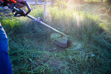 mowing a lawn with lawn mower